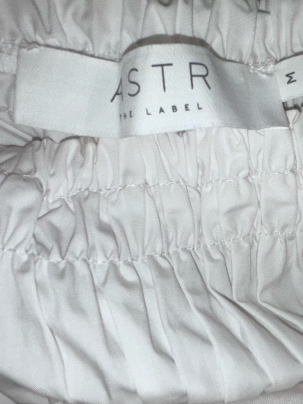 ASTR The Label Savina White Puff-Sleeve Peplum Smocked Top Size M NWOT - Picture 10 of 15